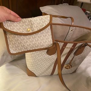 Michael Kors large tote with small clutch or make up bag. Purchased in March.